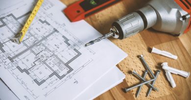 Building plan with tools 390x205 - What to Look For When Looking for Construction Companies