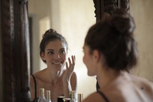 Woman smiling through the mirror 300x199 - Woman smiling through the mirror