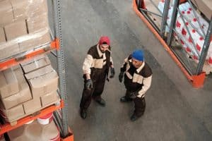 2 men standing in a warehouse talking 300x200 - 2 men standing in a warehouse talking.jpg