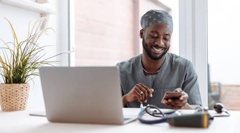 A Man in Scrub Suit Using His Cellphone 800x445 - How to Increase Patient Engagement with Marketing Tools