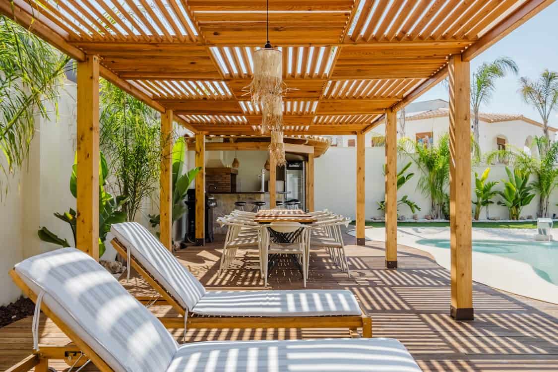 Modern Outdoor Patio with Pergola and Pool - Is Your Patio Too Hot? Here’s Why You Need Shade Now