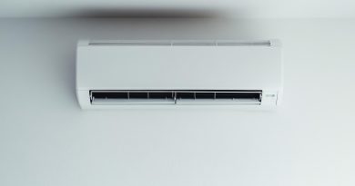 an ac unit attached on a white wall 390x205 - 5 Air Conditioner Maintenance Tips for Better Efficiency